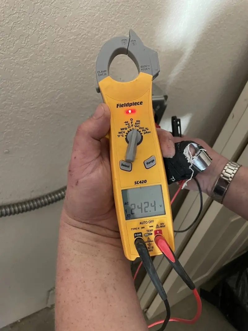 Voltage testing with clamp meter during Generator Installation in Oak Ridge